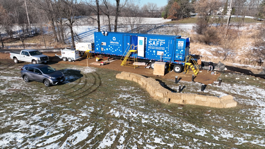 Photograph showing a blue-colored semi-trailer containing the SAFF system at a park in Lake Elmo. 