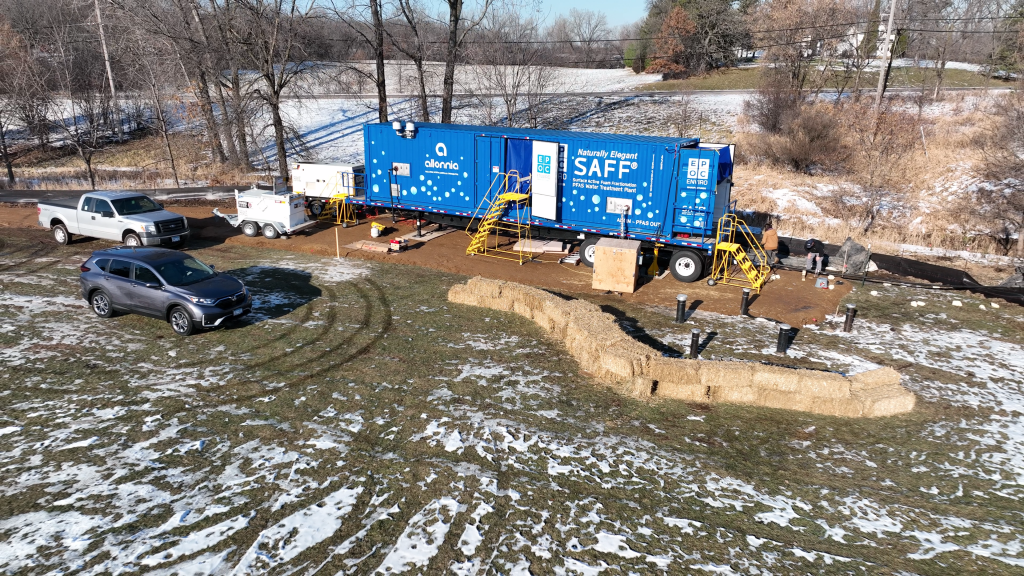 Photograph showing a blue-colored semi-trailer containing the SAFF system at a park in Lake Elmo.